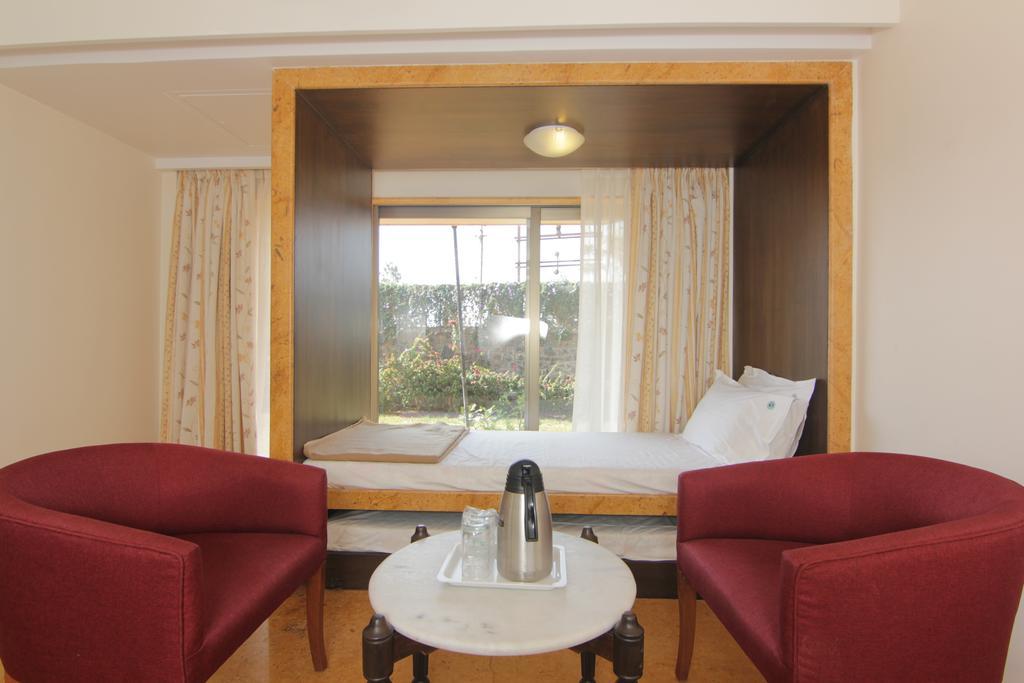 Aveda Blue Country Resort Panchgani Pokoj fotografie