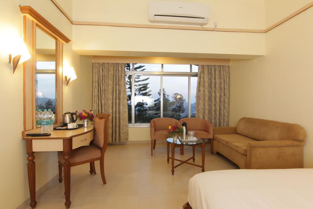 Aveda Blue Country Resort Panchgani Pokoj fotografie